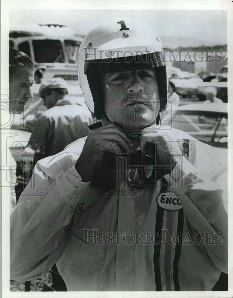 1968 Press Photo Race Car Driver A. J. Foyt Puts On His Helmet - nox19032- Historic Images