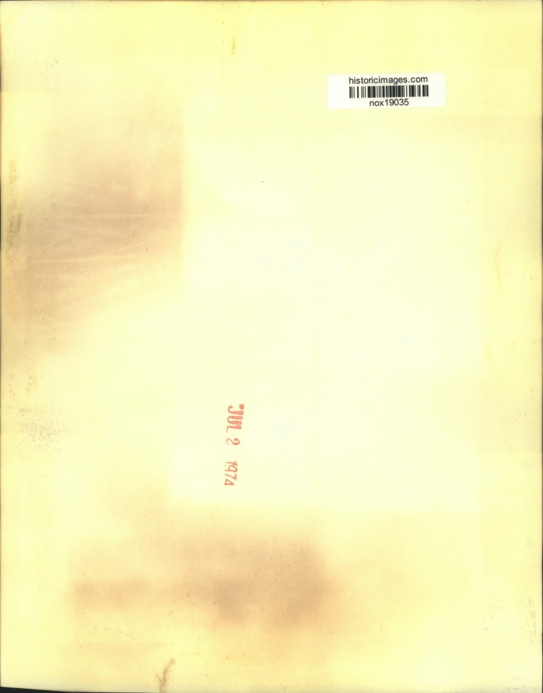 1974 Press Photo A. J. Foyt Checks Race Car Engine Prior to Pocono 500 Race