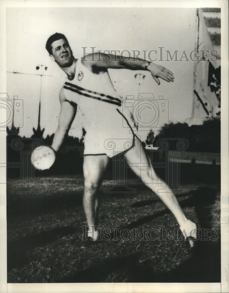 Load image into Gallery viewer, 1951 Press Photo Jim Fuchs wins discus throw at Pan-American Games - nox20573
