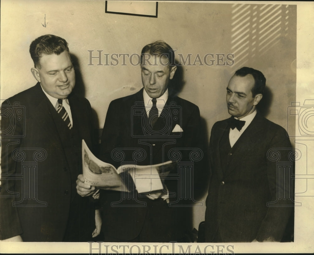1938 Press Photo F.A. Gastrock &amp; others check survey for farm laboratory