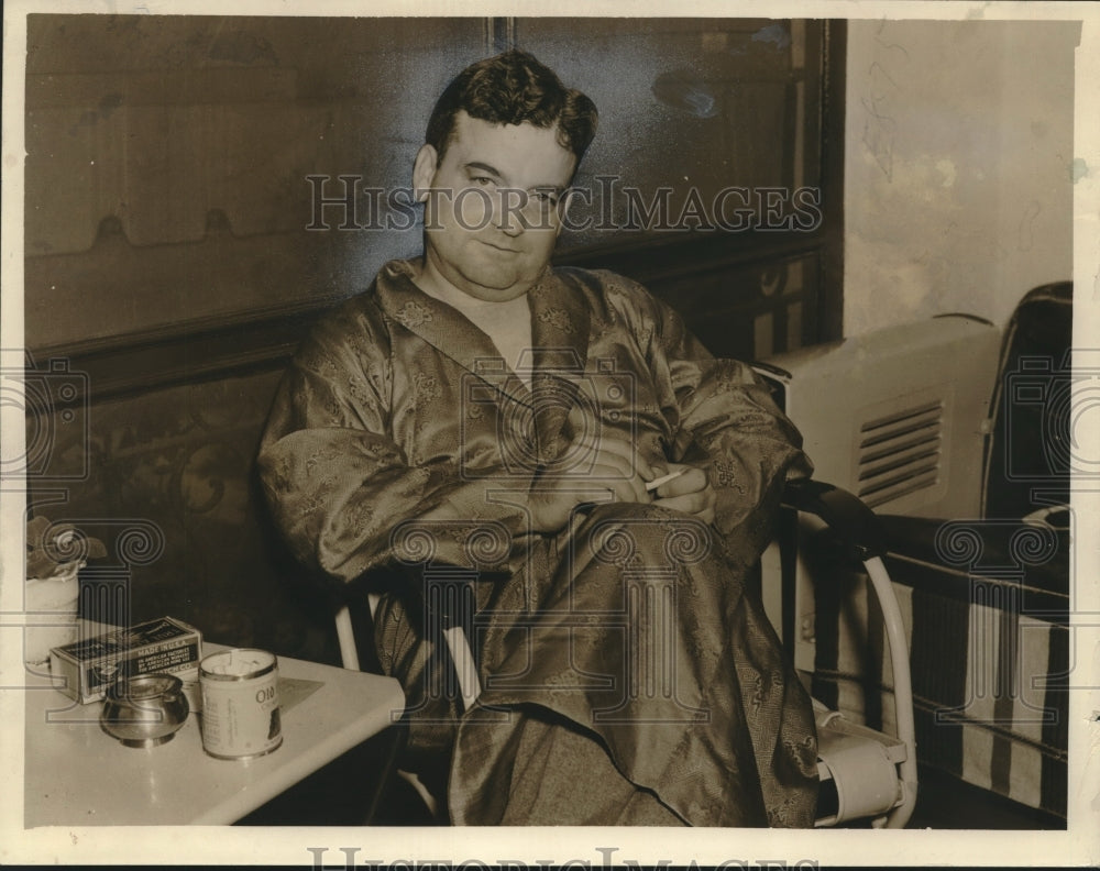 1942 Press Photo Emile P. Gassie relaxes - nox21043