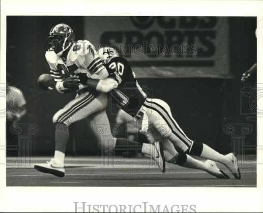 1984 Press Photo Falcon's Alfred Jackson has ball stripped by Saints' Gary- Historic Images