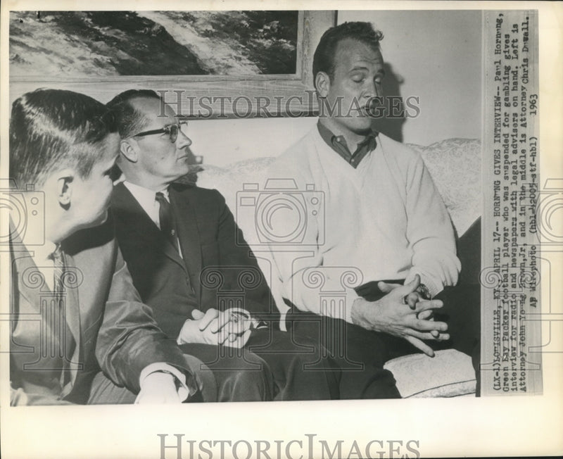 Load image into Gallery viewer, 1963 Press Photo Green Bay's Paul Hornung with attorneys gives interview.
