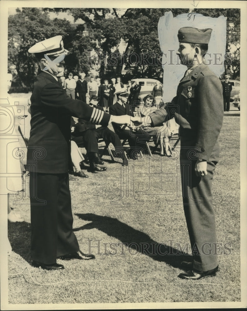 1951 Press Photo Sergeant Frank A. Golemi presented Purple Heart by Captain