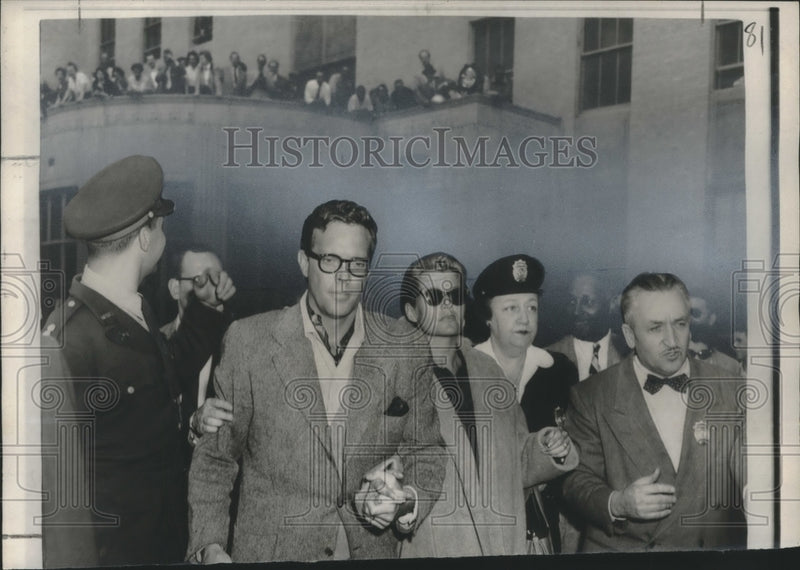 Load image into Gallery viewer, 1954 Press Photo Crooner Dick Haymes with wife Rita Hayworth leaving court
