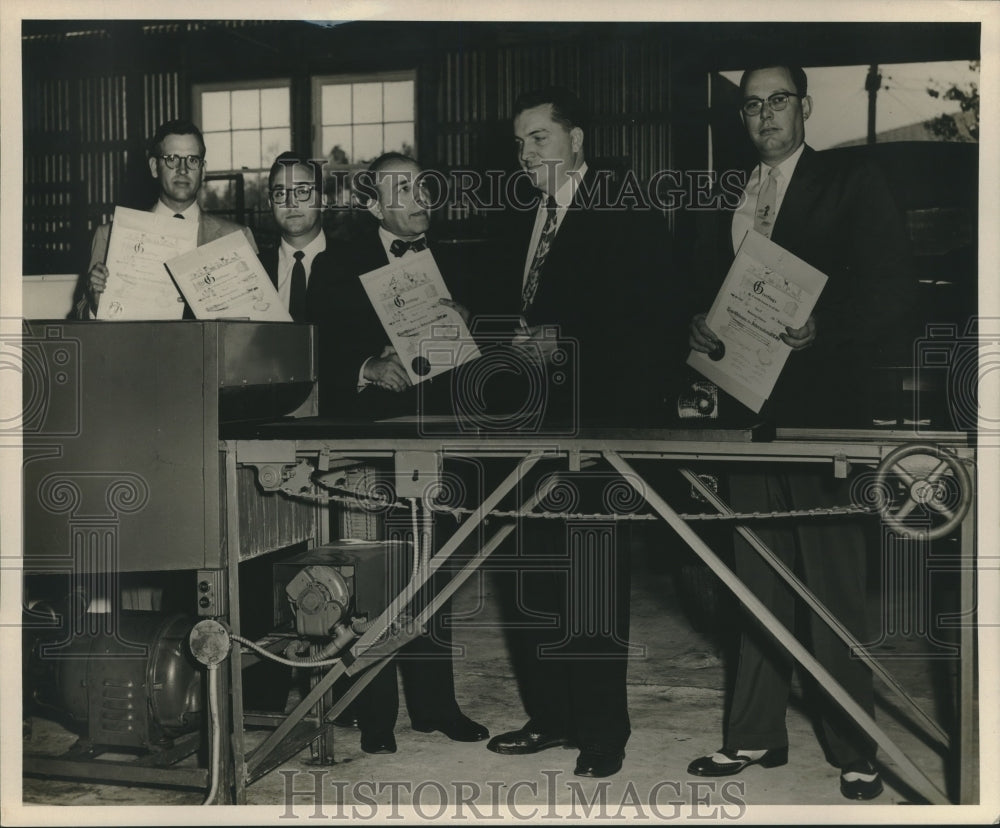 1953 Press Photo New Orleans Commissioner Schiro Awards Farr Company Employees