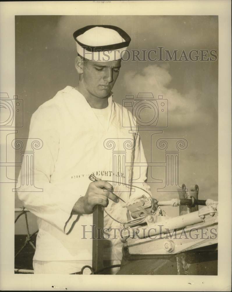 Load image into Gallery viewer, 1951 Press Photo Navy Man John E. Gutknecht Works at Sea - nox25027
