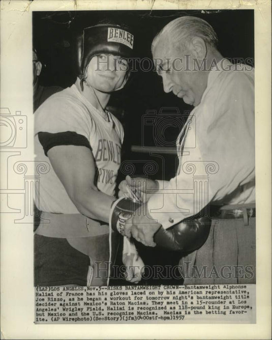 1957 Press Photo French Boxer Alphonse Halimi's Gloves Laced by Joe Rizzo