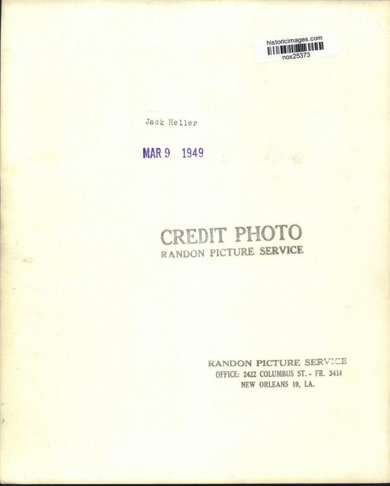 Load image into Gallery viewer, 1949 Press Photo Jack Heller at WWL Microphone, New Orleans - nox25373
