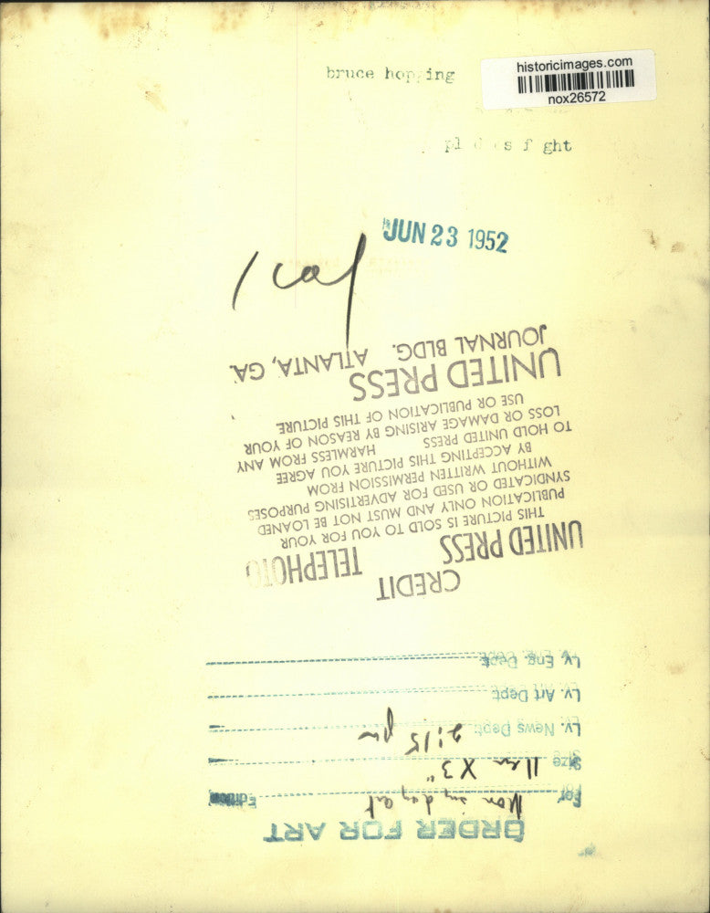 1952 Press Photo Bruce Hopping, 30, holds his bad conduct discharge papers