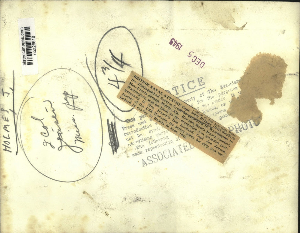 1949 Press Photo Captain John Holmes presents award to Mrs. Ursula Jensen