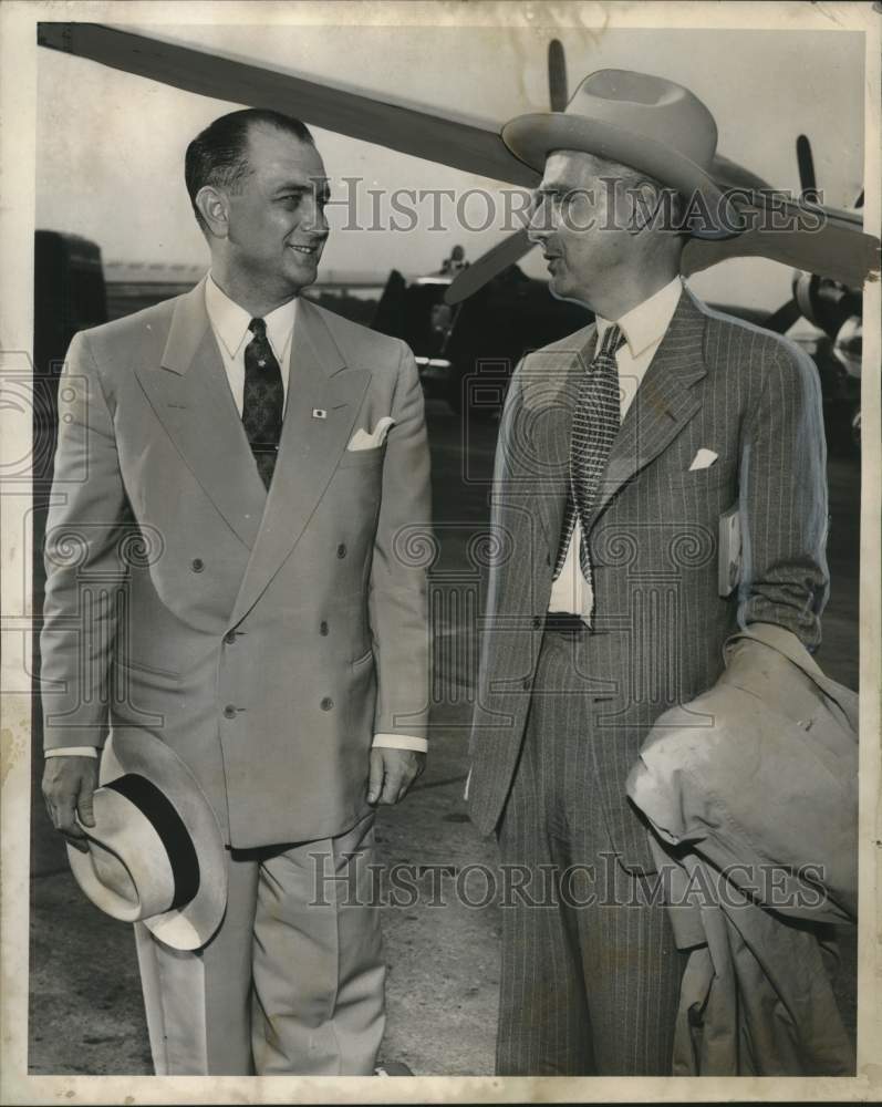 Load image into Gallery viewer, 1952 Press Photo H.K. Holmgren greeted by Maxwell J. Sareussen, New Orleans
