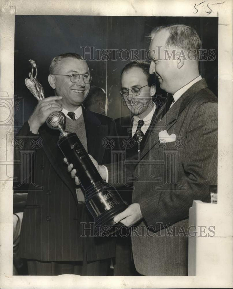 Load image into Gallery viewer, 1951 Press Photo Henry L. Hood receives trophy, Businessmen's Association
