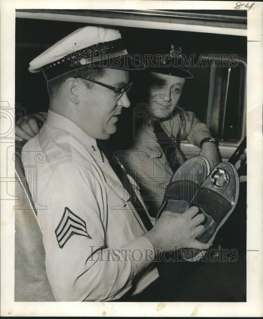 1956 Press Photo Police Officers Lampard, Server with Shoes of Suspect who Fled