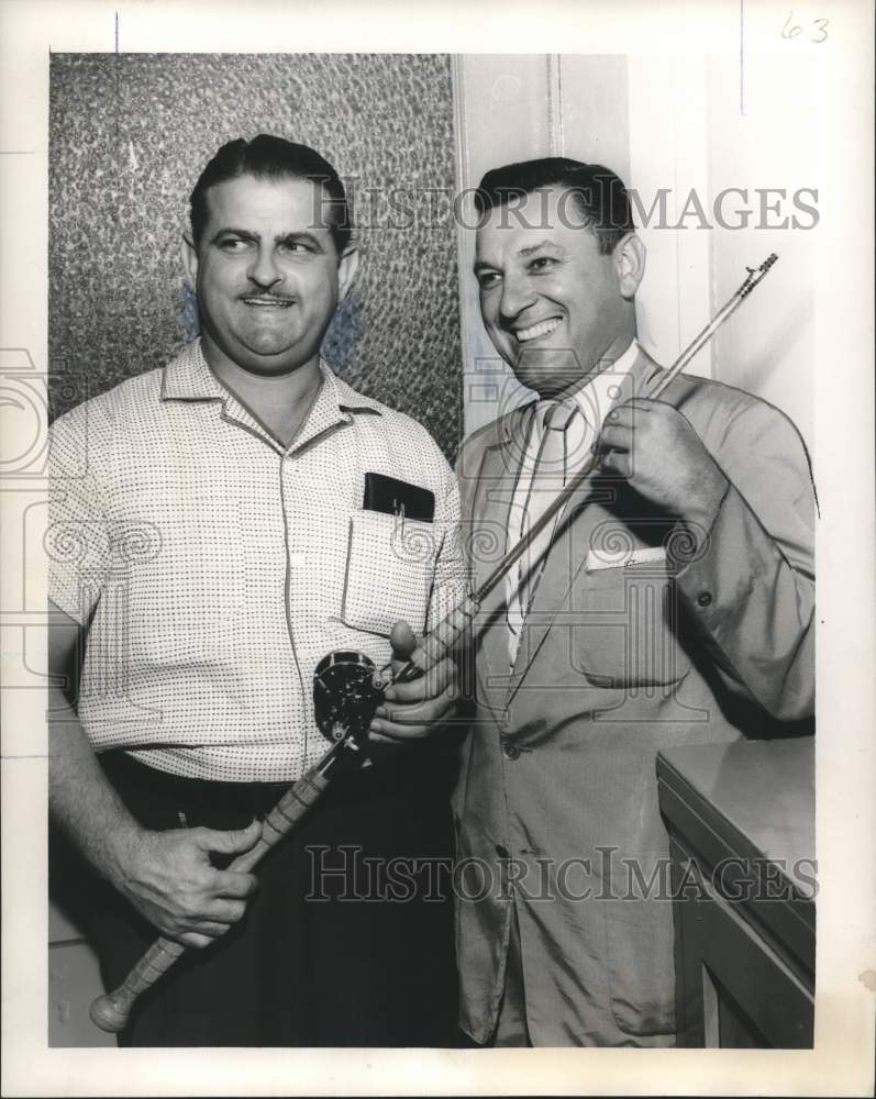1957 Press Photo Southwest Pass Fishing Rodeo Officials Check Equipment