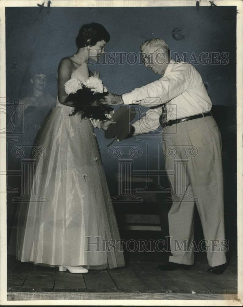 Load image into Gallery viewer, 1955 Press Photo Louisiana Broiler Festival Queen Gets Roses from Local Banker
