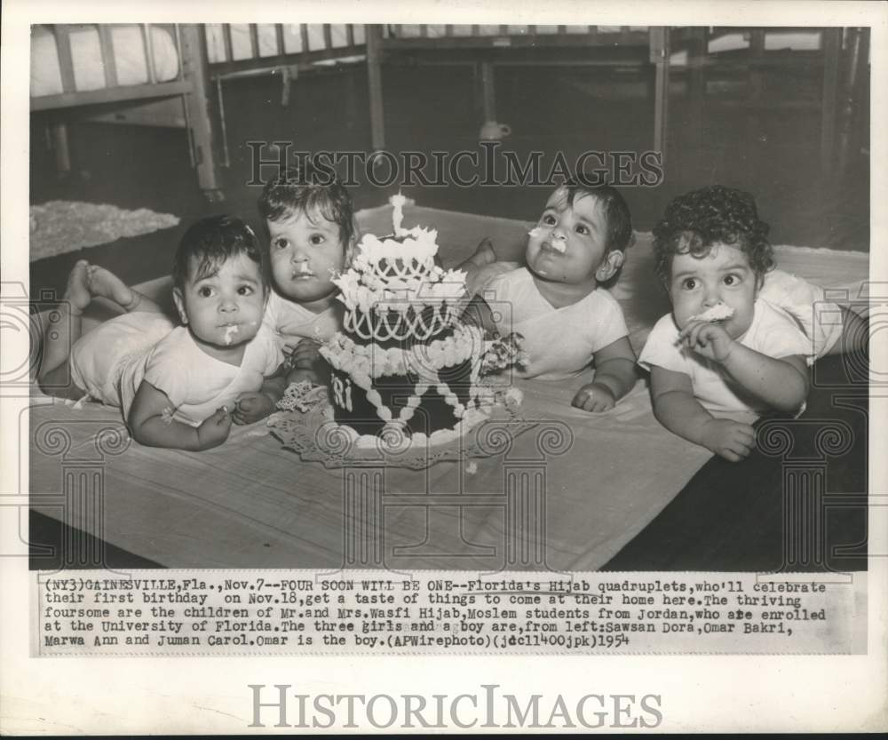 1954 Press Photo The Hijab quadruplets of Florida enjoy their birthday cake