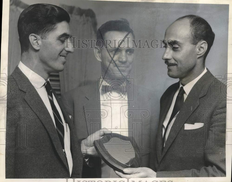 Load image into Gallery viewer, 1957 Press Photo Kenneth Jumonville receives a plaque at an event - nox28602

