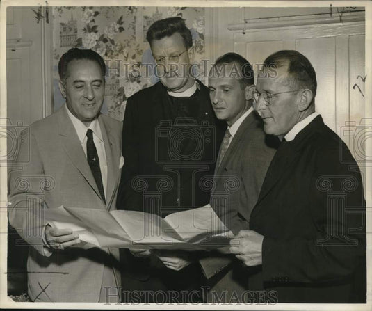 1957 Press Photo Holy Name Society members study plans for an upcoming rally