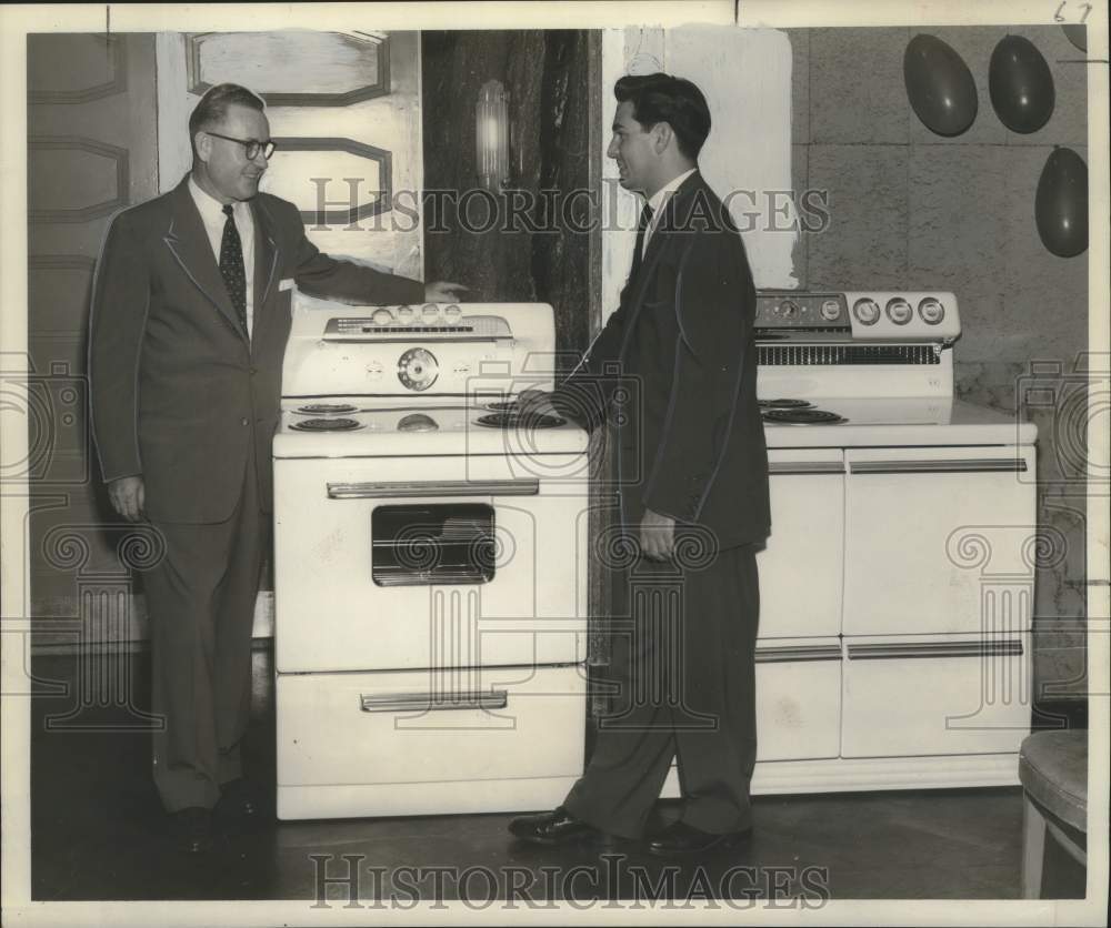 1953 Press Photo Westinghouse Managers E.H. Leveck, Leon Prejean with New Range- Historic Images