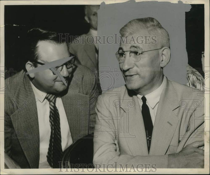 Load image into Gallery viewer, 1953 Press Photo Dr. S.S. Lewis in conversation at an event - nox30175
