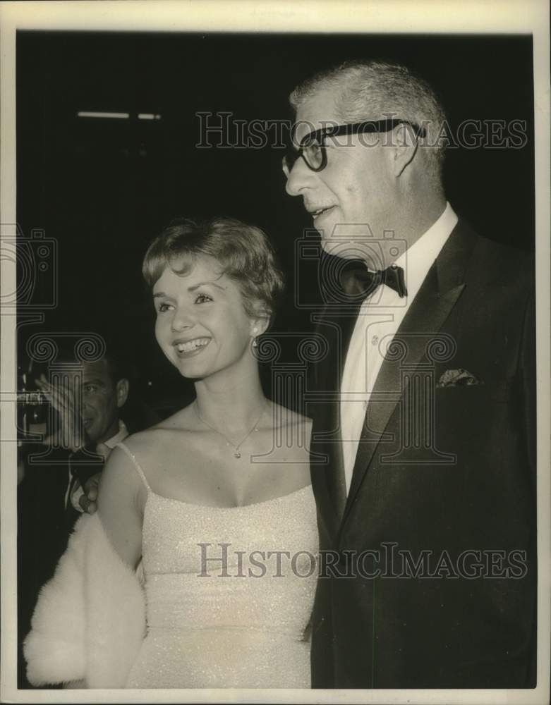 Load image into Gallery viewer, 1960 Press Photo Debbie Reynolds and Harry Karl at the premiere of "Ben Hur."
