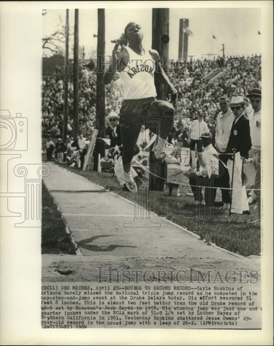 1964 Press Photo Gayle Hopkins in Long Jump Competition, Drake Relays