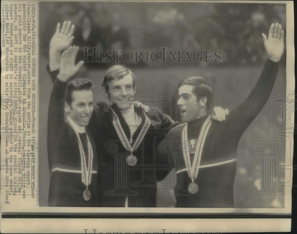 1968 Press Photo Gold, Silver &amp; Bronze Medalist Skiers Wave from Podium