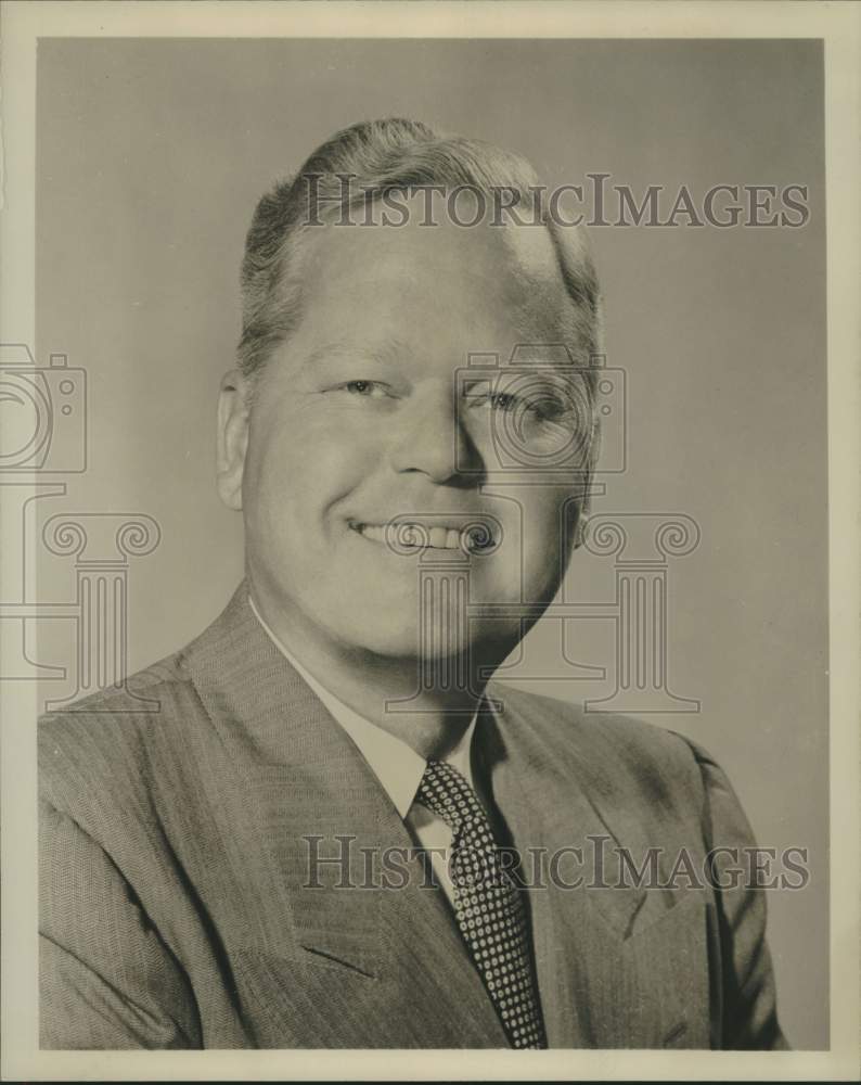 1951 Press Photo Finn H. Magnus, president, Magnus Harmonica Corporation.- Historic Images