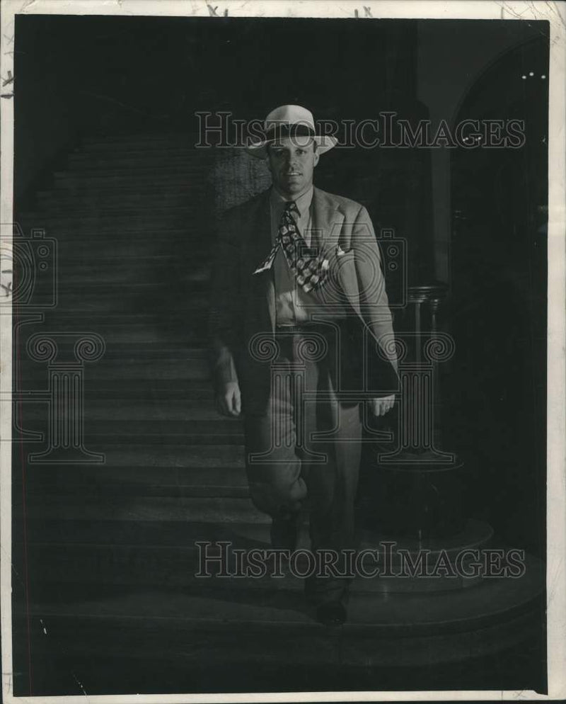 Load image into Gallery viewer, 1947 Press Photo Bill Maher has a spring in his step doing the job he likes best
