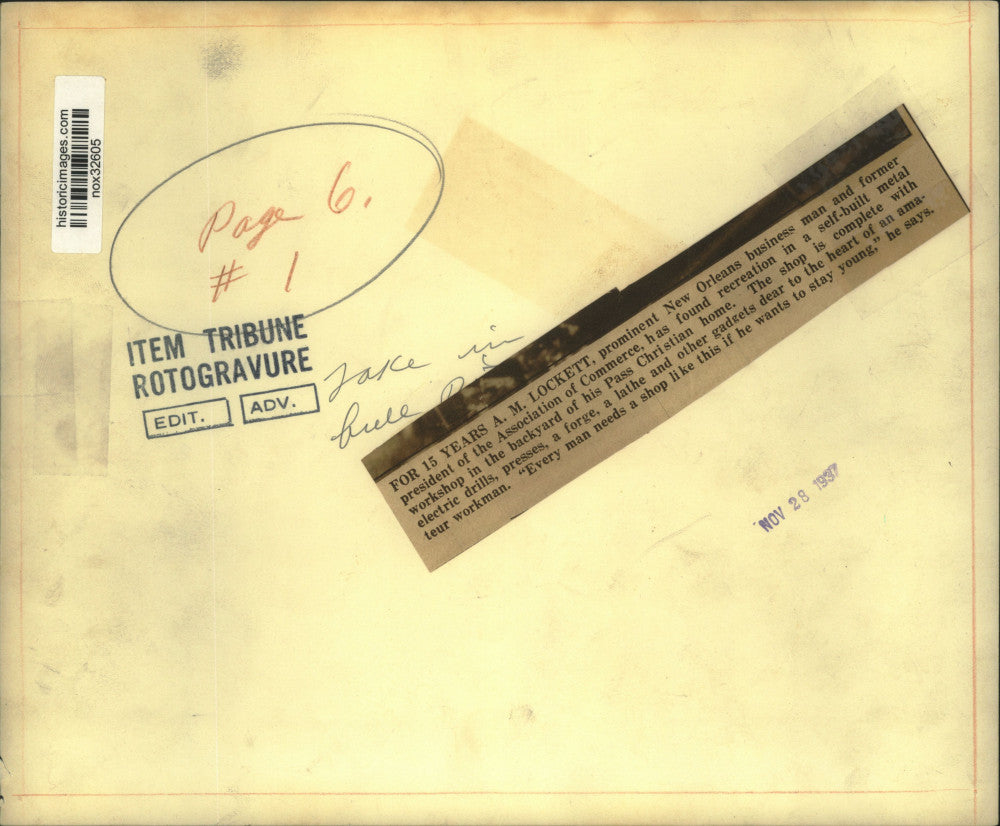 1937 Press Photo A.M. Lockett works in his homemade metal workshop, New Orleans