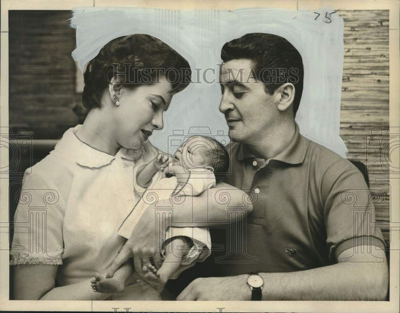 Load image into Gallery viewer, 1957 Press Photo Actor Hal March &amp; his wife Candy welcome new son, Peter
