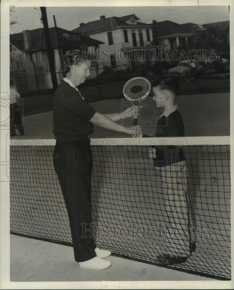 1957 Press Photo Raymond Palazzolo Jr. Gets Tennis Lesson - nox33148