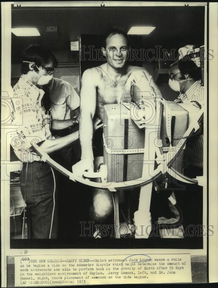1973 Press Photo Skylab Astronaut Jack Lousma on Exercise Bike after Flight