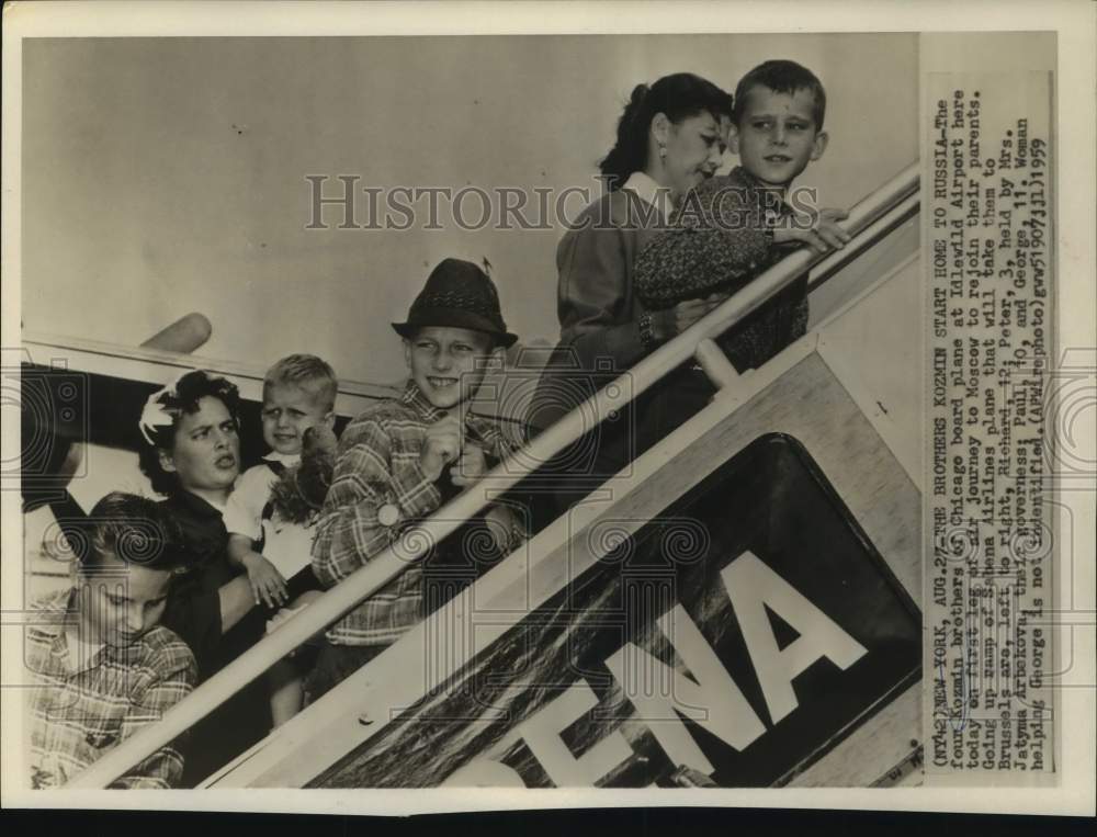 1959 Press Photo The four Kozmin brothers board a plane back to Russia
