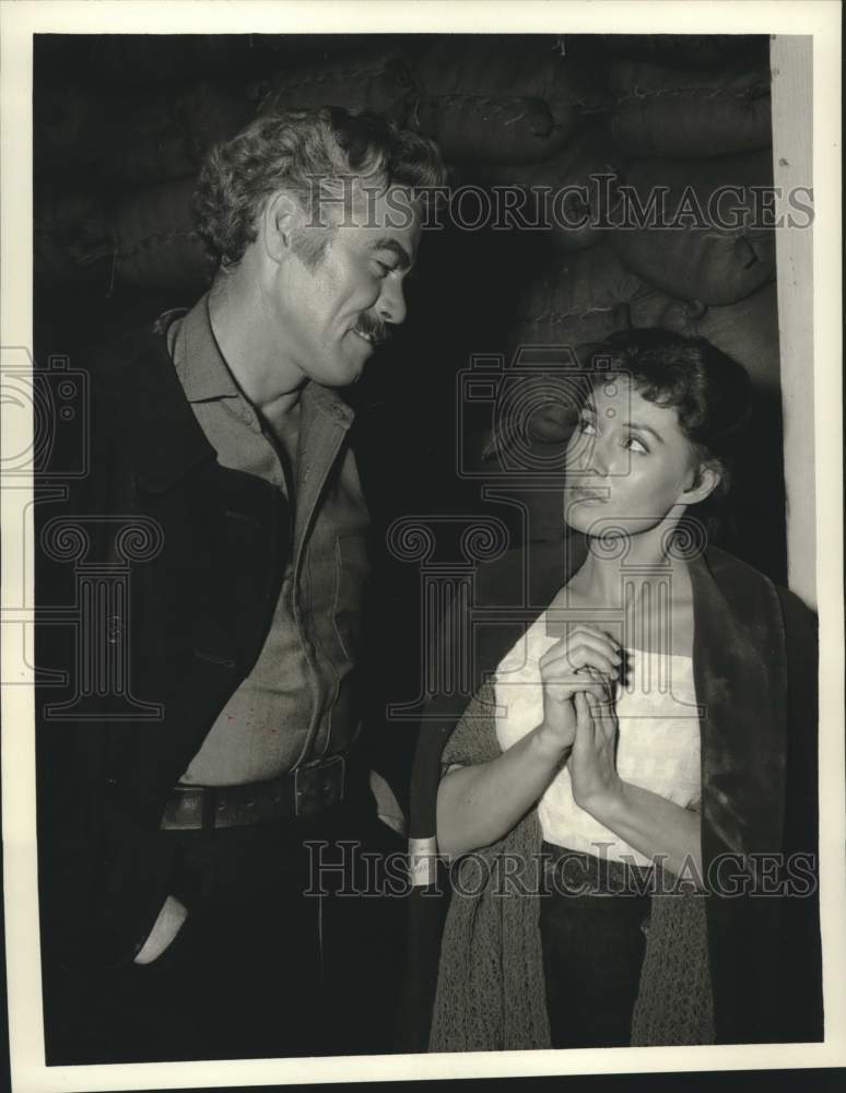 Load image into Gallery viewer, 1960 Press Photo Actors Jack Lambert, Patricia Michon on "Forbidden Island"
