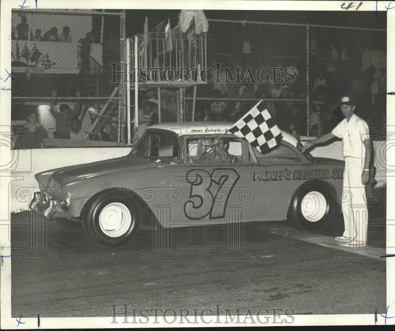 Load image into Gallery viewer, 1968 Press Photo Richard Keller claims another checkered flag at Louisiana 500.
