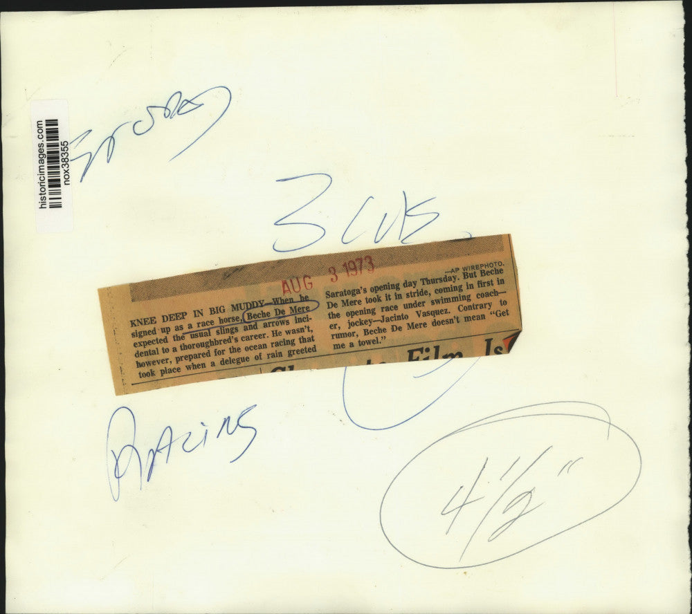 1973 Press Photo Beche De Mere in a deluge of rain at Saratoga's opening day.