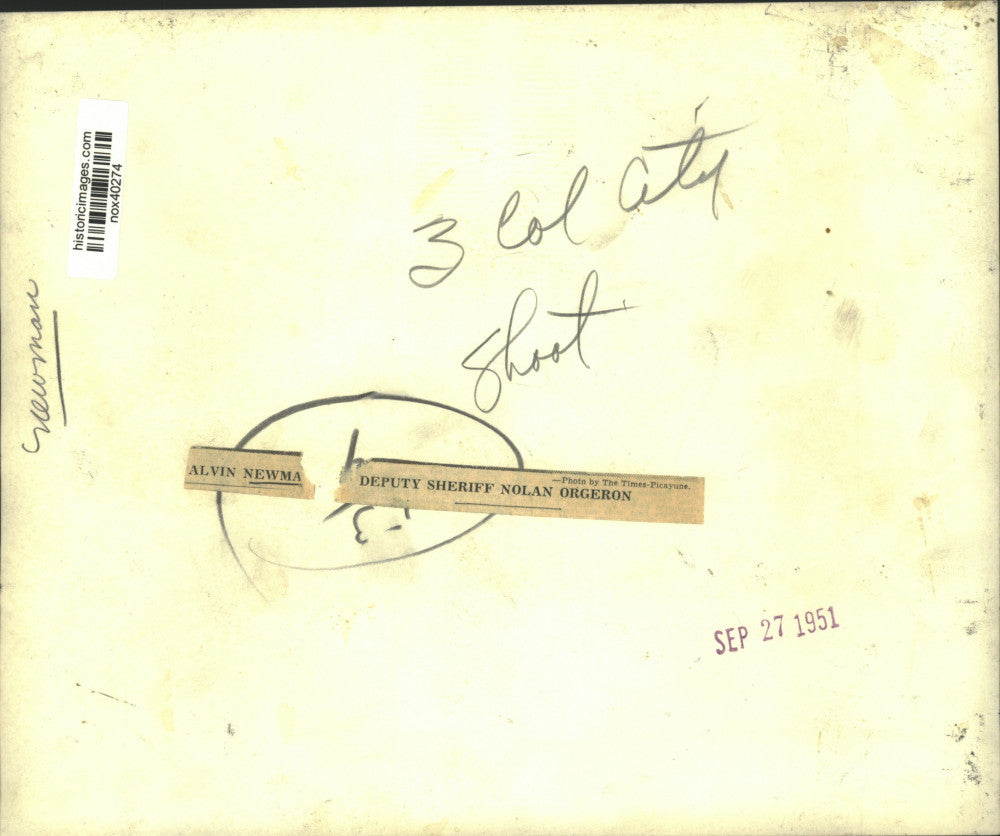 1951 Press Photo Alvin Newman and Deputy Sheriff Nolan Orgeron in a police car.