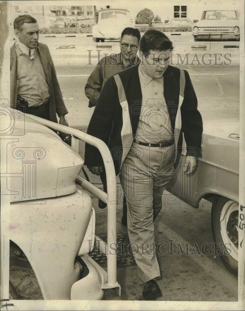 1966 Press Photo Robert J. Steele, held for recent fires in New Orleans.- Historic Images