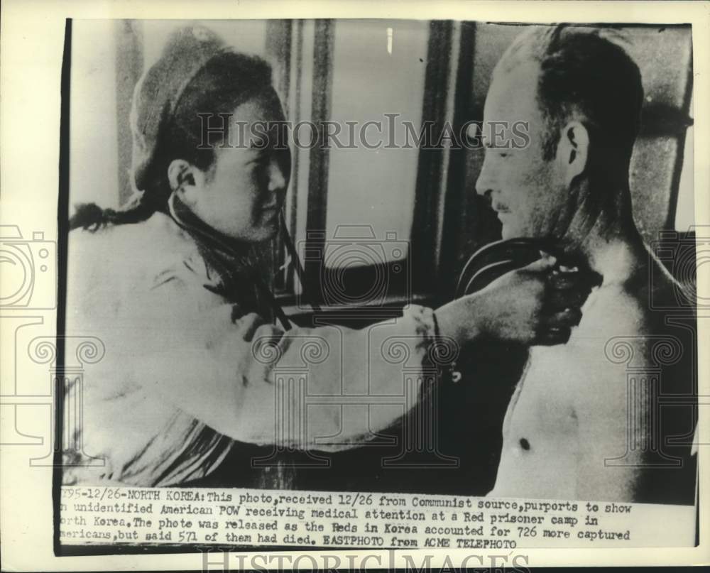 1951 Press Photo American POW Receives Medical Attention at North Korean Camp