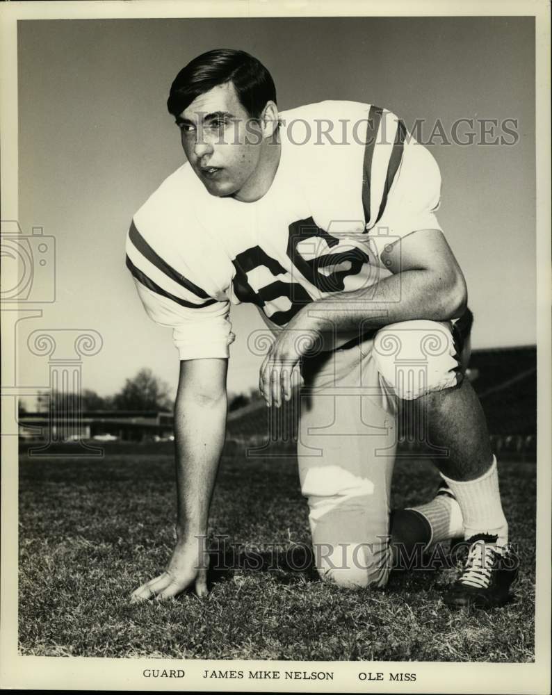 1964 Press Photo Ole Miss football guard James Mike Nelson kneels on the field- Historic Images