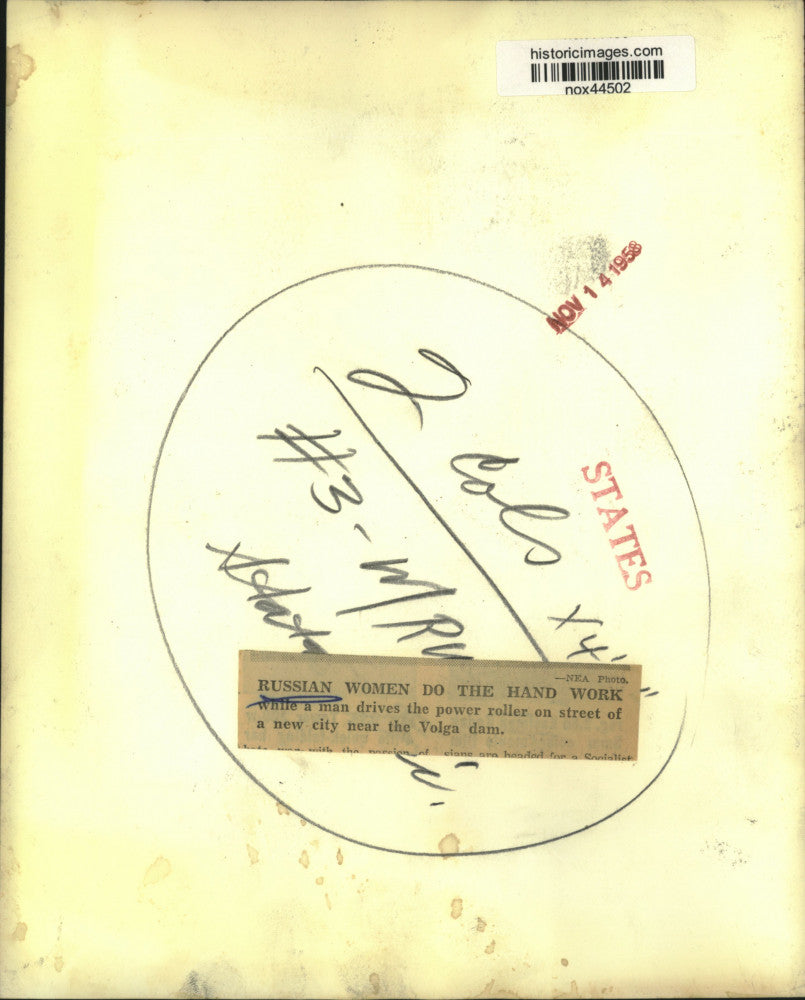 1958 Press Photo Russian women do street hand work, a man drives power roller