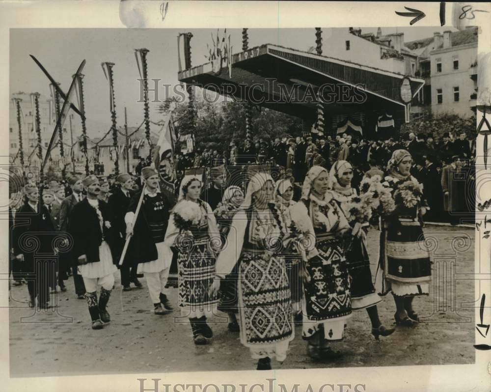 1937 Press Photo Peasants in costumes march in a freedom celebration in Serbia- Historic Images