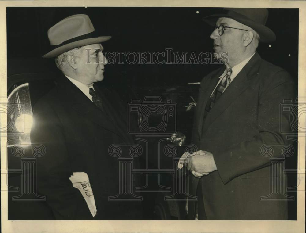 1941 Press Photo Joseph McHugh greets Congressman Charles Wolverton, New Orleans