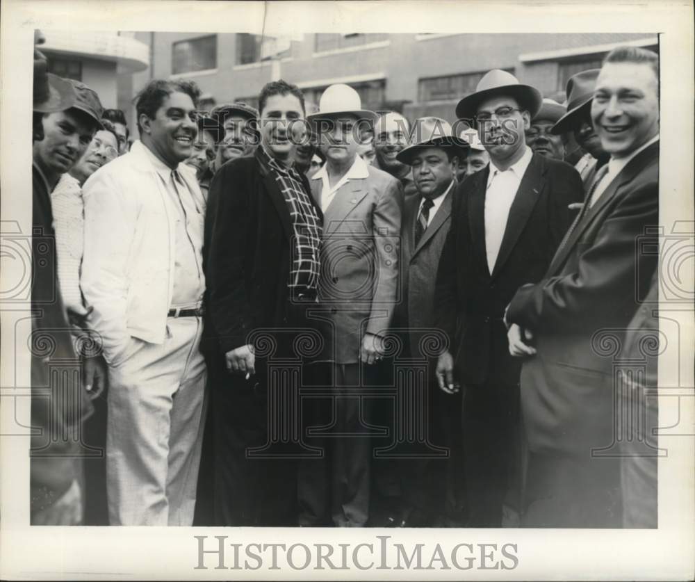 1956 Press Photo Union vice president and president pose with union workers.- Historic Images