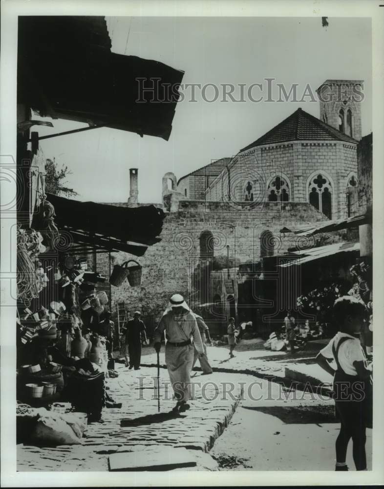 Load image into Gallery viewer, Press Photo Crooked alleys and busy people in market of Nazareth, Israel
