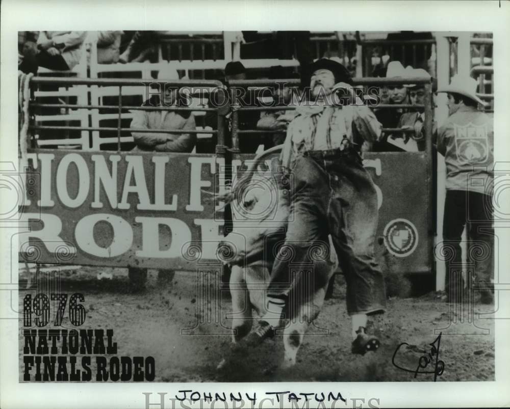 1976 Press Photo Rodeo clown hit by a bull, National Finals Rodeo - pia01390- Historic Images