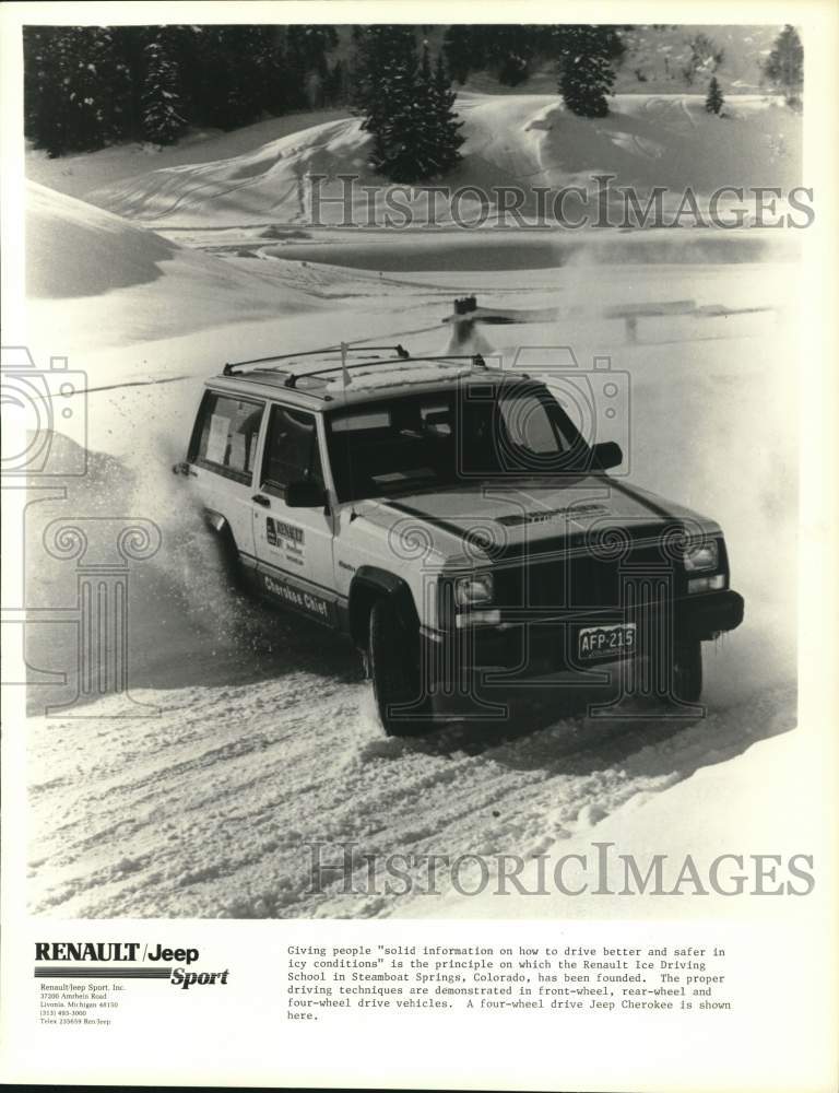 1984 Press Photo Jeep Cherokee being driven in snowy terrain in CO - pia04797