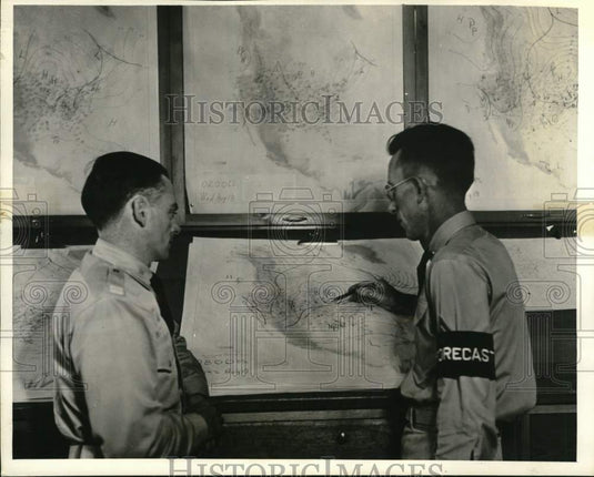 Press Photo Army pilot & official forecaster, weather charts - pim01782